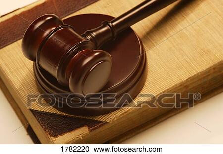 Gavel on a book View Large Photo Image Stock Image - Gavel on a book. Fotosearch