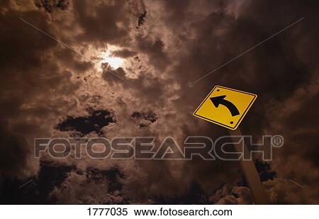 Stock Photography - Road sign against a cloudy sky. Fotosearch