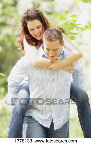 Stock Image - Couple hanging out together. Fotosearch