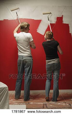 Stock Photo - Couple painting together. Fotosearch