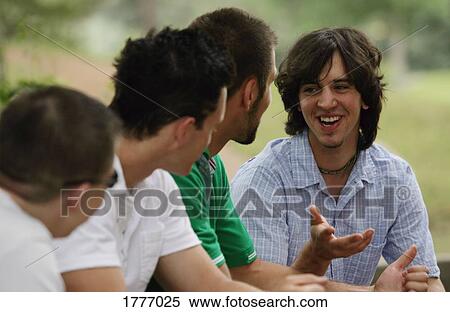 Four men visiting View Large Photo Image Stock Photography - Four men visiting. Fotosearch