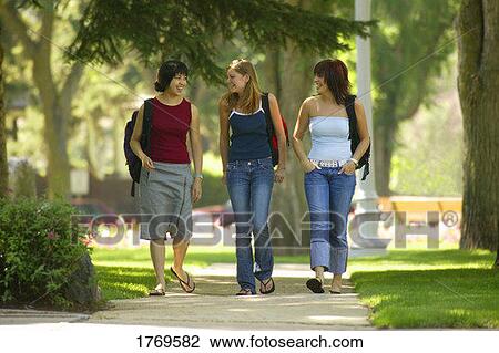 Stock Image - Girls walking. Fotosearch
