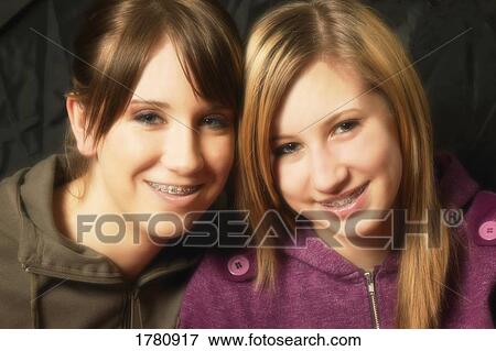 Girls with braces View Large Photo Image Stock Photo - Girls with braces. Fotosearch