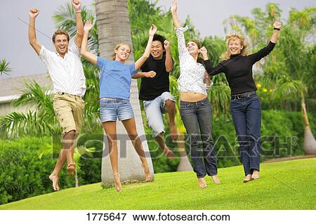 Group of teens jumping View Large Photo Image Stock Photo - Group of teens jumping. Fotosearch