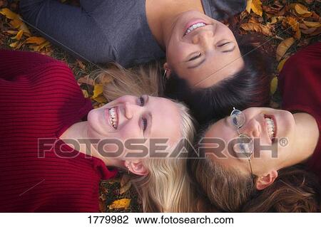 Group of three women View Large Photo Image Stock Image - Group of three women. Fotosearch