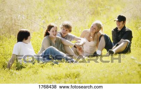 Stock Photo - Teens hanging out. Fotosearch