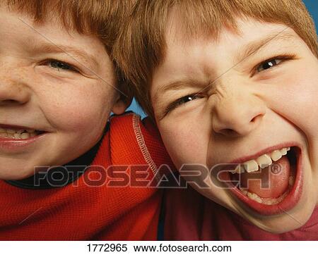 Two noisy young friends View Large Photo Image Stock Photography - Two noisy young friends. Fotosearch