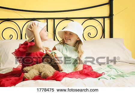 Young girls playing dress up View Large Photo Image Stock Photography - Young girls playing dress up. Fotosearch