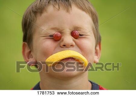 Stock Image - A fruity face. Fotosearch