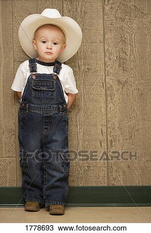 Boy with cowboy hat View Large Photo Image Stock Image - Boy with cowboy hat. Fotosearch
