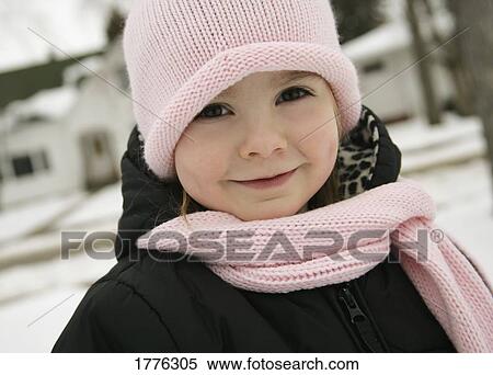 close up of little girl wearing a pink hat and scarf View Large Photo Image Stock Photography - close up of little girl wearing a pink hat and scarf. Fotosearch