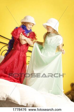 Girls playing dress up View Large Photo Image Stock Photograph - Girls playing dress up. Fotosearch