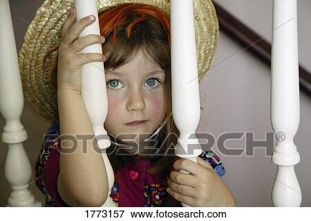 Little girl sitting on the stairs View Large Photo Image Stock Photo - Little girl sitting on the stairs. Fotosearch