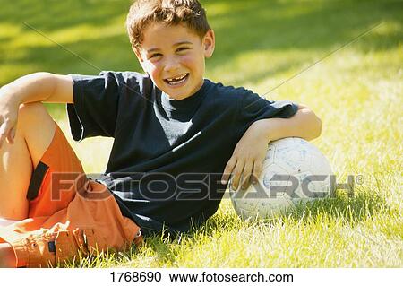 Stock Image - Portrait of a soccer player. Fotosearch