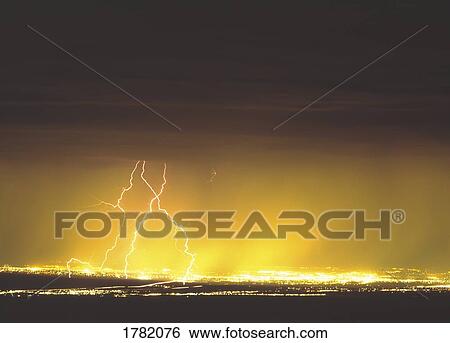 Lightning strikes over city View Large Photo Image Stock Photograph - Lightning strikes over city. Fotosearch