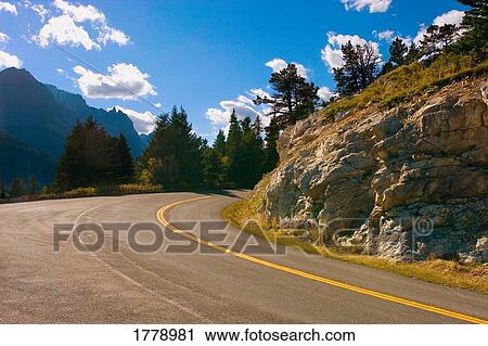 A road through the mountains View Large Photo Image Stock Image - A road through the mountains. Fotosearch