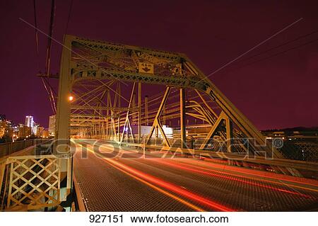 Stock Image - Bridge at night. Fotosearch
