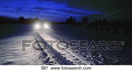 Stock Photo - Car and tire tracks in snow. Fotosearch