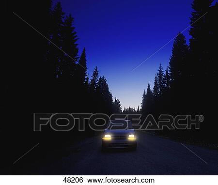Stock Photograph - Driving at night. Fotosearch