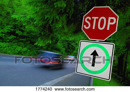 Stock Image - Stop sign and traffic. Fotosearch