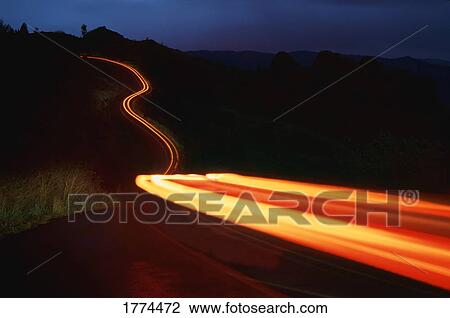 Time delay of headlights on country road View Large Photo Image Stock Image - Time delay of headlights on country road. Fotosearch