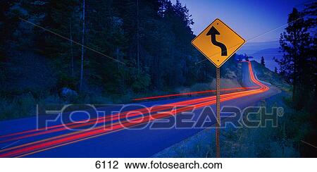 Time delay of vehicles on mountain road at dusk View Large Photo Image Stock Image - Time delay of vehicles on mountain road at dusk. Fotosearch
