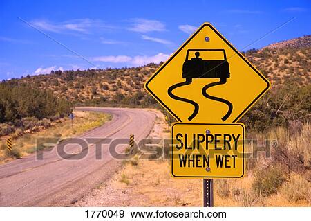 Stock Photo - Warning sign on side of road. Fotosearch