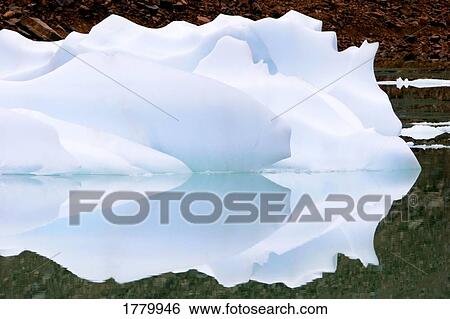 Stock Photograph - A glacier on a lake. Fotosearch