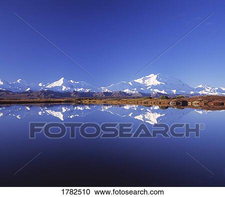 Stock Image - Beautiful blue mountain scene. Fotosearch