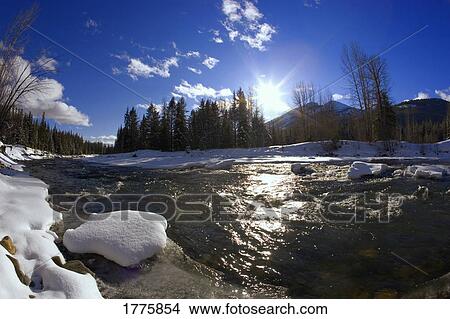 Flowing river and winter scenery View Large Photo Image Picture - Flowing river and winter scenery. Fotosearch