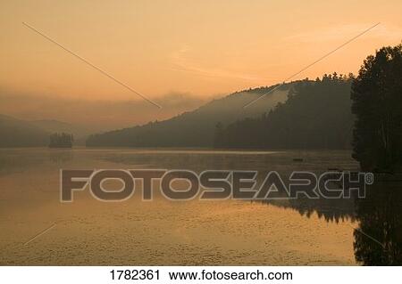 Stock Image - Fog over water scenic. Fotosearch