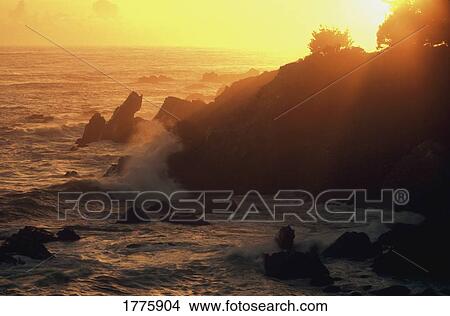 Sunset over the ocean View Large Photo Image Picture - Sunset over the ocean. Fotosearch