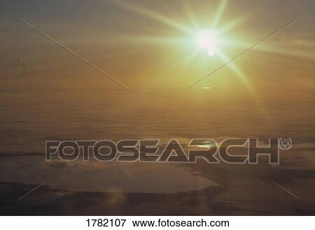 Aerial view of sunbursts over Florida lakes, USA View Large Photo Image Stock Photo - Aerial view of sunbursts over Florida lakes, USA. Fotosearch