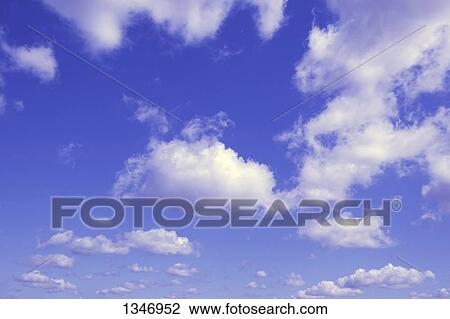 Blue sky with clouds View Large Photo Image Stock Image - Blue sky with clouds. Fotosearch