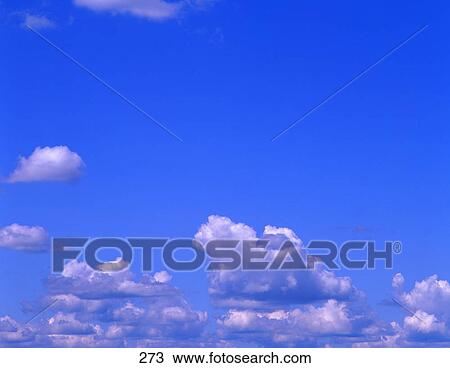 Stock Image - Clear blue sky with white clouds. Fotosearch