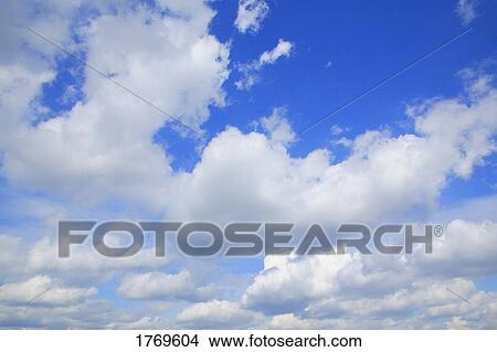Picture - Clouds in a blue sky. Fotosearch