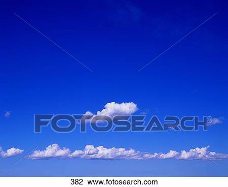 Stock Image - Clouds in sky. Fotosearch