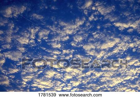Clouds in the sky View Large Photo Image Stock Photo - Clouds in the sky. Fotosearch