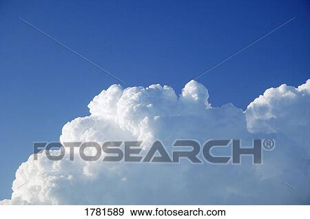 Fluffy clouds View Large Photo Image Stock Photo - Fluffy clouds. Fotosearch