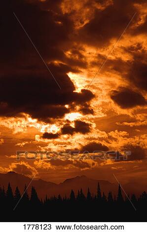 Stock Image - Orange, yellow, red sky. Fotosearch