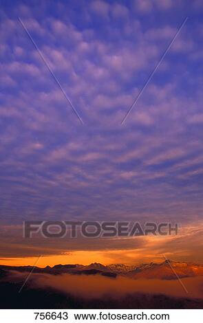 Sun set on mountains View Large Photo Image Stock Image - Sun set on mountains. Fotosearch