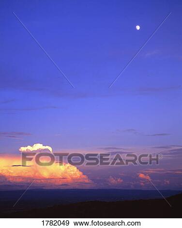 Sunset with Moon, seen from Jerome, Arizona, USA View Large Photo Image Stock Photo - Sunset with Moon, seen from Jerome, Arizona, USA. Fotosearch