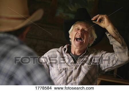 Picture - A cowboy's smile. Fotosearch