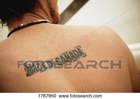 Stock Image - A man with a tattoo. Fotosearch