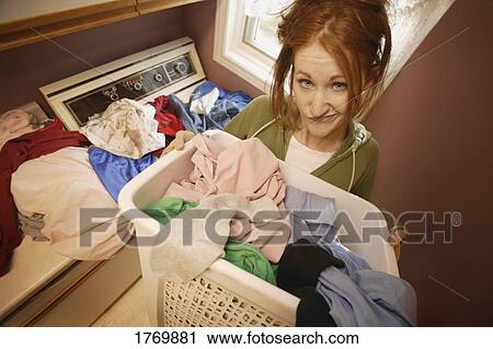 Bogged down with dirty laundry View Large Photo Image Stock Image - Bogged down with dirty laundry. Fotosearch