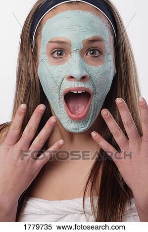 Stock Photography - Getting a facial masque. Fotosearch