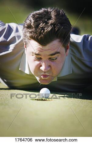 Stock Photograph - Helping the ball. Fotosearch