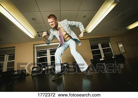 I'm the man - dancing on boardroom table View Large Photo Image Stock Image - I'm the man - dancing on boardroom table. Fotosearch