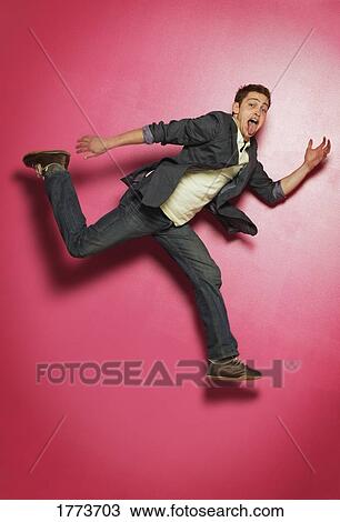Man making funny face View Large Photo Image Stock Image - Man making funny face. Fotosearch