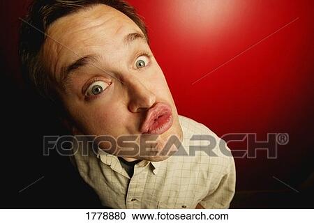 Man puckering up View Large Photo Image Stock Image - Man puckering up. Fotosearch